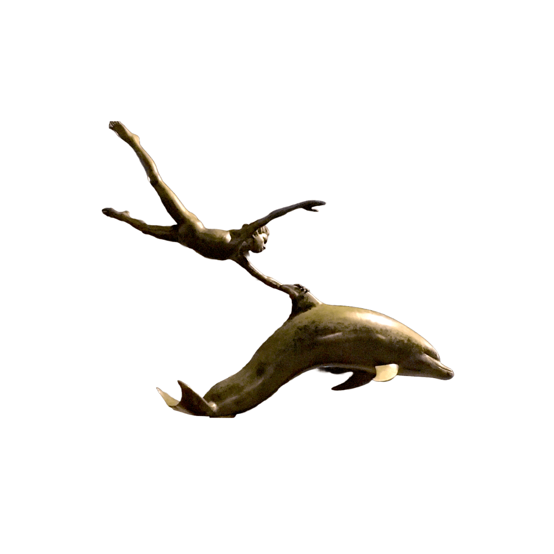 A small bronze sculpture of two dolphins turning together.