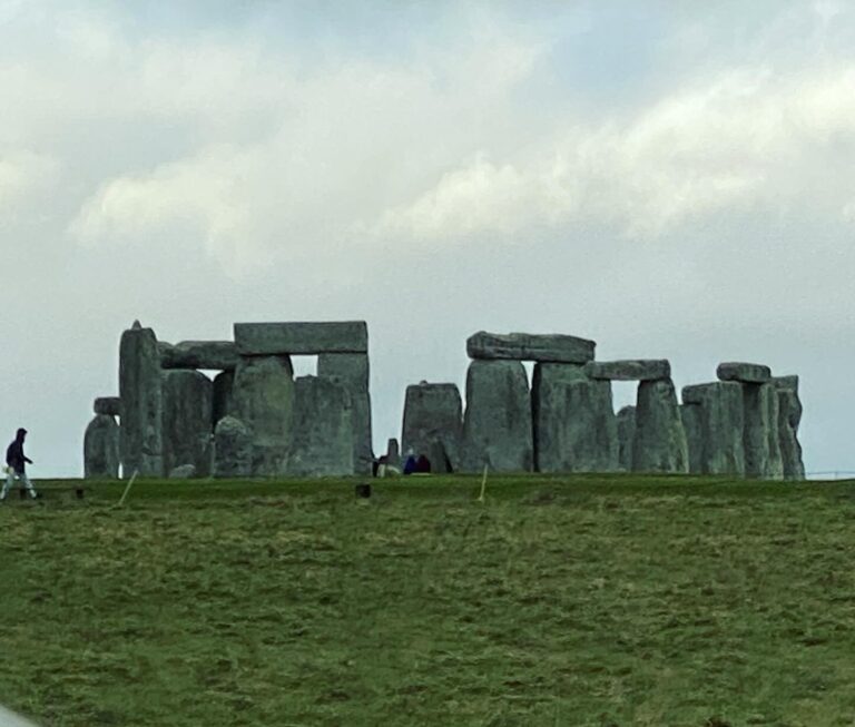 Standing stones at Stonehenge under an open sky