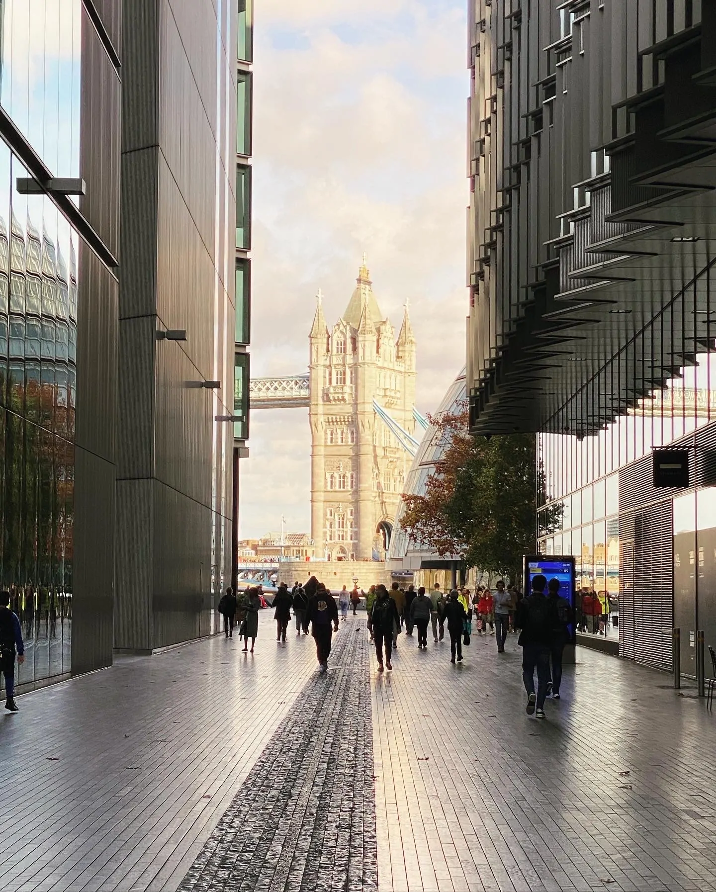 Psychosynthesis Therapy: What It Is and How It Works Alex Golding Therapy A narrow city street running between tall buildings, figures small in the distance.