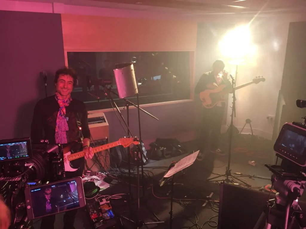 Alex Golding in a live studio recording session.